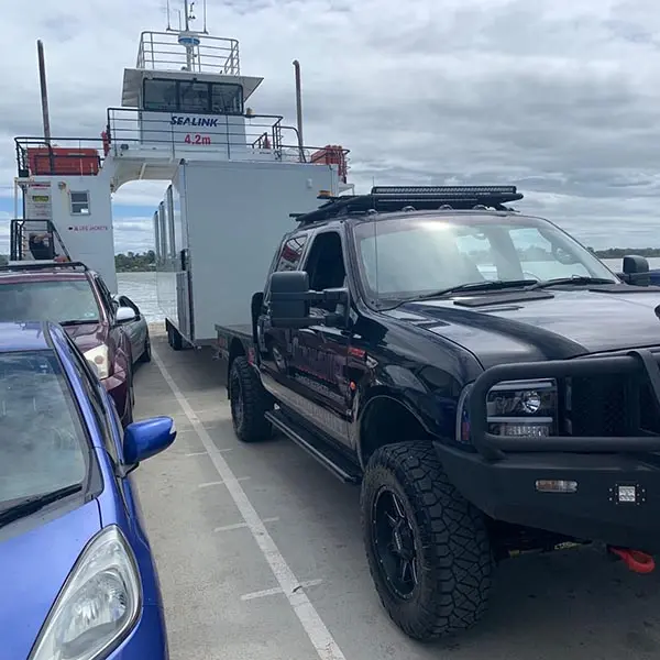 Tiny House Transport Australia - Delivering freedom Australia-wide - Shifting a tiny house on the Bribie island ferry